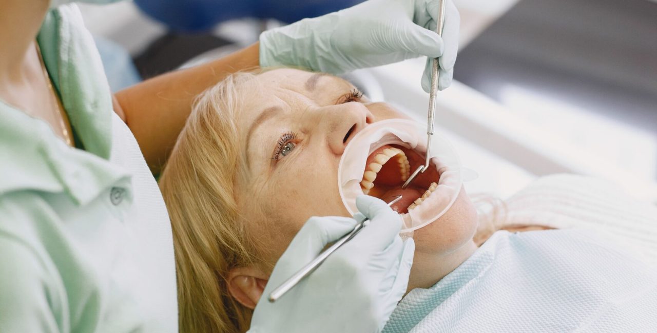 Dentist performing a professional oral examination in clinic